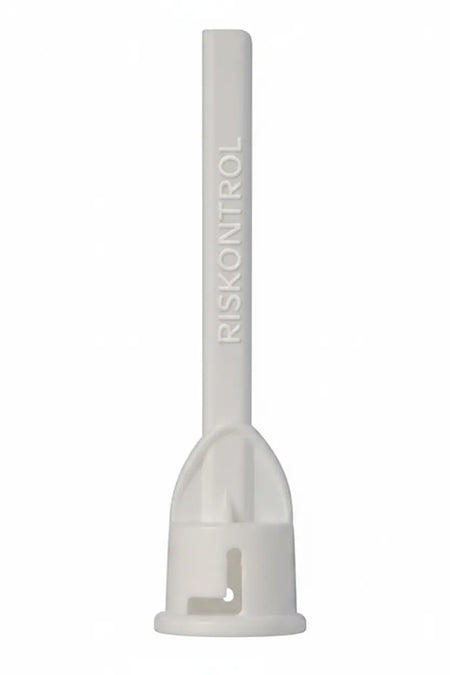 Close-up of Acteon RISKONTROL White Mint disposable air water syringe tip showing flexible dual channel design
