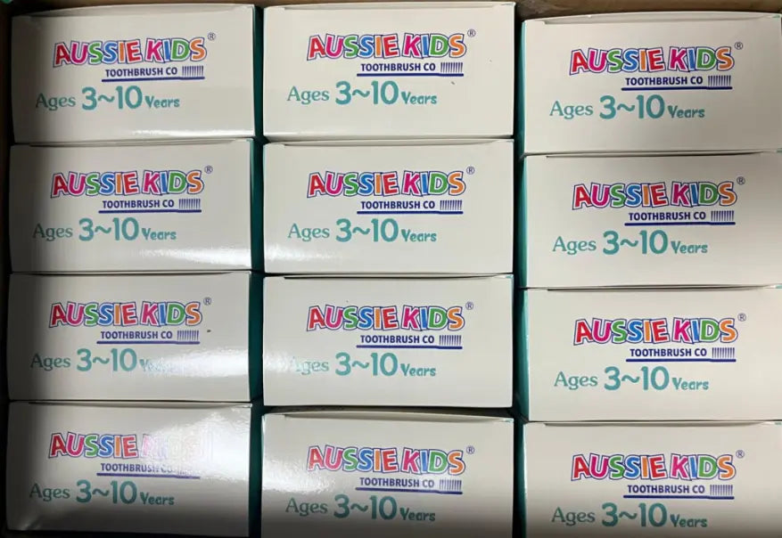 Bulk stock of Kids Ultra Soft Toothbrushes 12 Pack cartons prepared for supply across Australia.