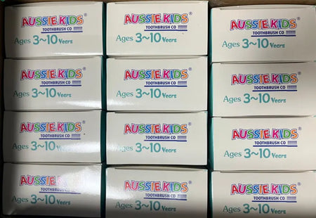 Bulk stock of Kids Ultra Soft Toothbrushes 12 Pack cartons prepared for supply across Australia.