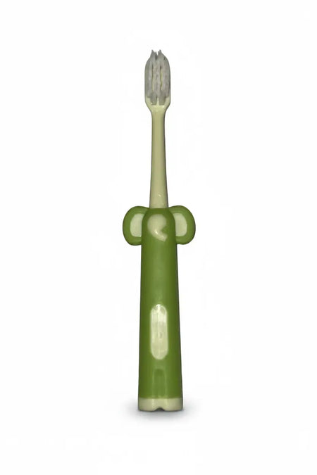 Aussie Kids Toothbrush Co® ultra-soft kids toothbrush standing upright with a flat base and elephant ear grip handle designed for children’s comfortable everyday brushing.