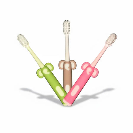 Assorted colour Kids Ultra Soft Toothbrushes with elephant face handles displayed in a fan arrangement, showing green, beige and pink toothbrushes with ultra-soft bristles.