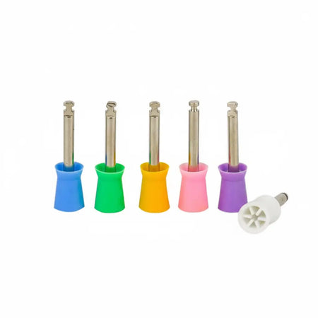 Close-up of multi-colour latch-type prophy cups showing soft flexible web design for contour adaptation and reduced operator fatigue