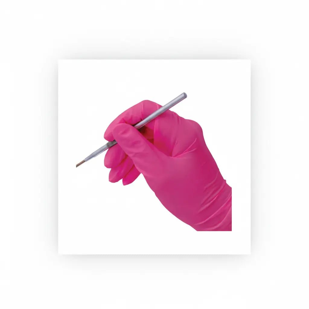 Pink thin nitrile examination gloves with close fit design for reduced hand fatigue and improved tactile sensitivity