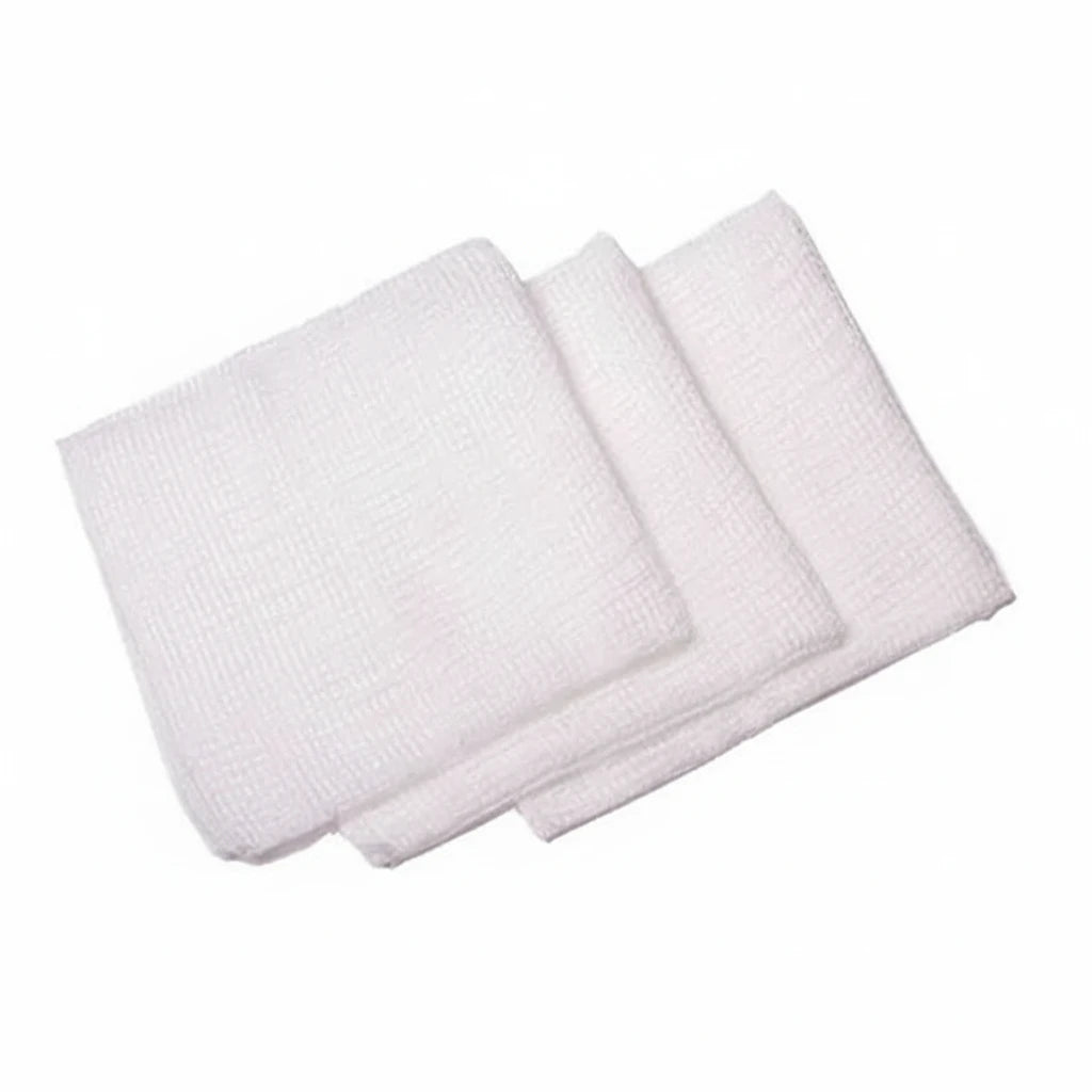 Opened sterile 7.5cm x 7.5cm 8 ply cotton gauze swabs ready for wound care